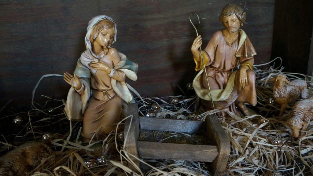 a nativity scene of jesus and mary in a manger scene