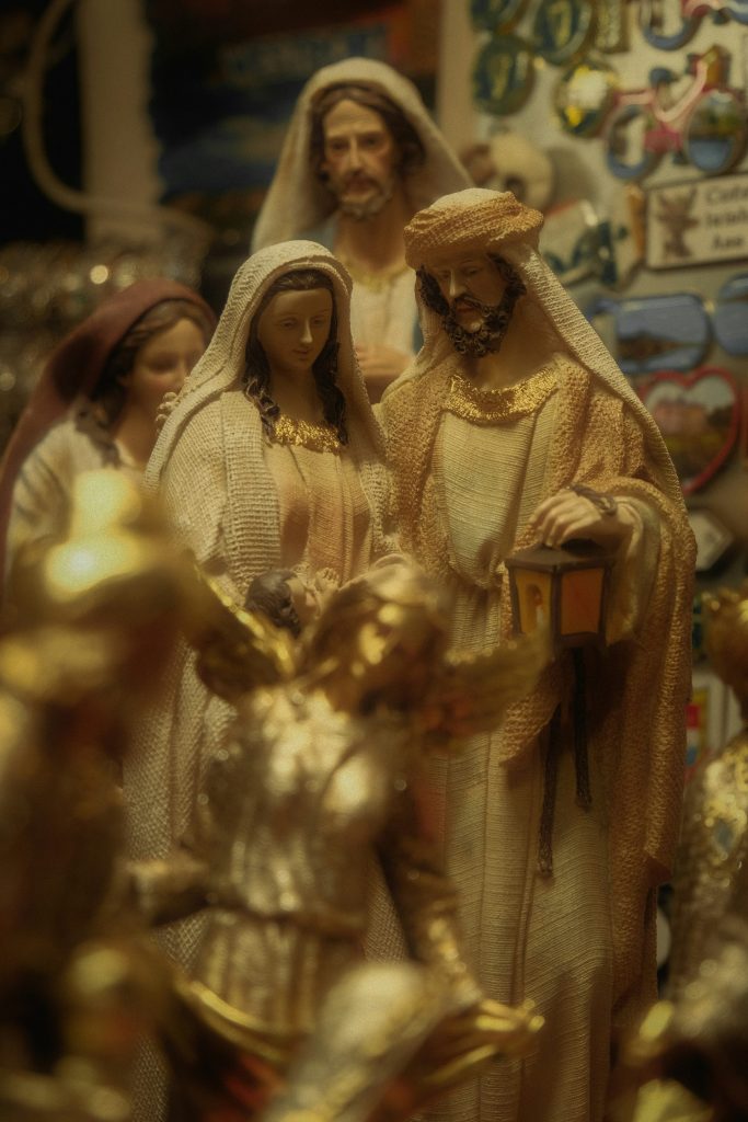 Nativity scene figurines with mary, joseph, and baby jesus.